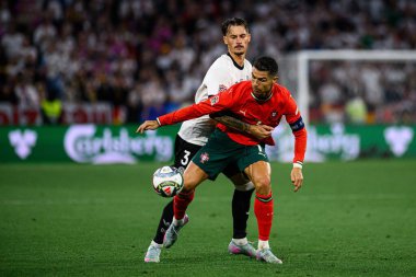 MUNICH, GERMANY - 4 Haziran 2025: Robin Koch, Cristiano Ronaldo - UEFA Uluslar Ligi 2025 Almanya - Allianz Arena 'da Portekiz' e karşı. 