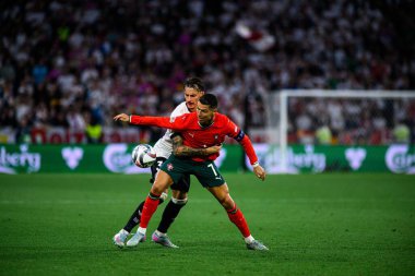 MUNICH, GERMANY - 4 Haziran 2025: Robin Koch, Cristiano Ronaldo - UEFA Uluslar Ligi 2025 Almanya - Allianz Arena 'da Portekiz' e karşı. 