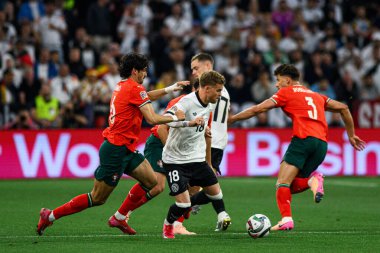 MUNİH, GERMANY - 4 Haziran 2025: Maximilian Mittelstadt, Ruben Dias, Joao Palhinha - UEFA Milletler Ligi 2025 Almanya - Allianz Arena 'da Portekiz' e karşı. 
