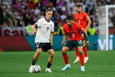 MUNİH, GERMANY - 4 Haziran 2025: Florian Wirtz, Ruben Neves - UEFA Uluslar Ligi 2025 Almanya - Allianz Arena 'da Portekiz' e karşı. 