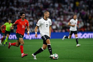 MUNICH, GERMANY - 4 Haziran 2025: Francisco Trincao, Waldemar Anton - UEFA Milletler Ligi 2025 Almanya - Allianz Arena 'da Portekiz' e karşı. 