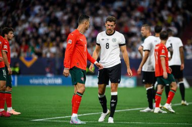 MUNICH, GERMANY - 4 Haziran 2025: Cristiano Ronaldo, Leon Goretzka - UEFA Uluslar Ligi 2025 Almanya - Allianz Arena 'da Portekiz' e karşı. 