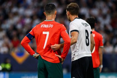 MUNICH, GERMANY - 4 Haziran 2025: Cristiano Ronaldo, Leon Goretzka - UEFA Uluslar Ligi 2025 Almanya - Allianz Arena 'da Portekiz' e karşı. 