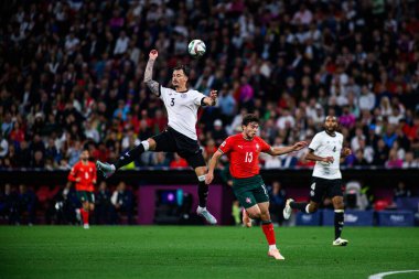 MUNİH, GERMANY - 4 Haziran 2025: Robin Koch, Joao Neves - UEFA Uluslar Ligi 2025 Almanya - Allianz Arena 'da Portekiz' e karşı. 