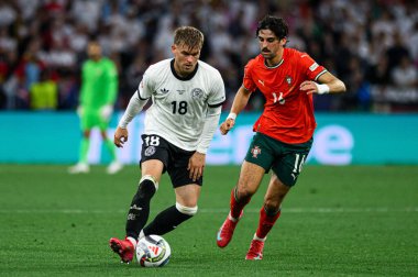 MUNICH, GERMANY - 4 Haziran 2025: Maximilian Mittelstadt, Francisco Trincao - UEFA Milletler Ligi 2025 Almanya Allianz Arena 'da Portekiz' e karşı. 