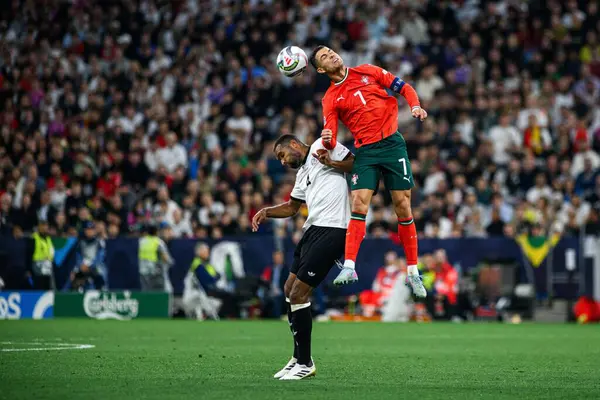 MUNICH, GERMANY - 4 Haziran 2025: Jonathan Tah, Cristiano Ronaldo - UEFA Uluslar Ligi 2025 Almanya - Allianz Arena 'da Portekiz' e karşı. 