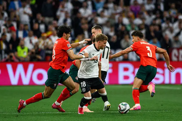 MUNİH, GERMANY - 4 Haziran 2025: Maximilian Mittelstadt, Ruben Dias, Joao Palhinha - UEFA Milletler Ligi 2025 Almanya - Allianz Arena 'da Portekiz' e karşı. 