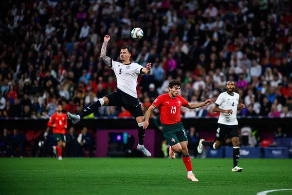 MUNİH, GERMANY - 4 Haziran 2025: Robin Koch, Joao Neves - UEFA Uluslar Ligi 2025 Almanya - Allianz Arena 'da Portekiz' e karşı. 