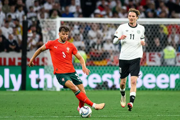 MUNİH, GERMANY - 4 Haziran 2025: Ruben Dias, Nick Woltemade - UEFA Uluslar Ligi 2025 Almanya - Allianz Arena 'da Portekiz' e karşı. 