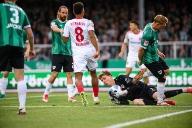 MUENSTER, GERMANY - 22 AĞUSTOS, 2025: 2.Bundesliga SC Preussen Munster 1 futbol karşılaşması. FC Nurnberg LVM-Preussenstadion 'da