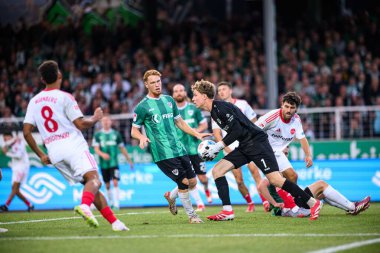 MUENSTER, GERMANY - 22 AĞUSTOS, 2025: 2.Bundesliga SC Preussen Munster 1 futbol karşılaşması. FC Nurnberg LVM-Preussenstadion 'da