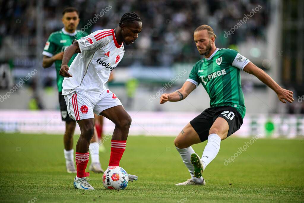MUENSTER, GERMANY - 22 AUGUST, 2025: The football match of 2.Bundesliga SC Preussen Munster  1. FC Nurnberg at LVM-Preussenstadion