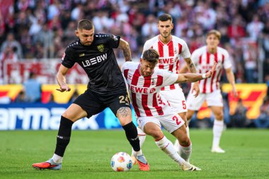 COLOGNE, GERMANY - 28 SEPTEMBER, 2025: Jeff Chabot, Joel Schmied - Bundesliga 1.FC Koeln vs VfB Stuttgart maçı Rhein Energie Stadion 'da.