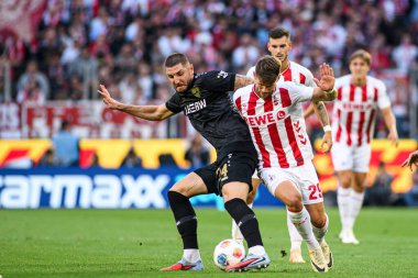 COLOGNE, GERMANY - 28 SEPTEMBER, 2025: Jeff Chabot, Joel Schmied - Bundesliga 1.FC Koeln vs VfB Stuttgart maçı Rhein Energie Stadion 'da.