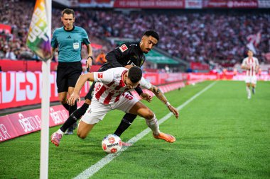COLOGNE, GERMANY - 28 SEPTEMBER, 2025: Tom Krauss, Tiago Tomas - Bundesliga 1.FC Koeln vs VfB Stuttgart maçı Rhein Energie Stadion 'da.