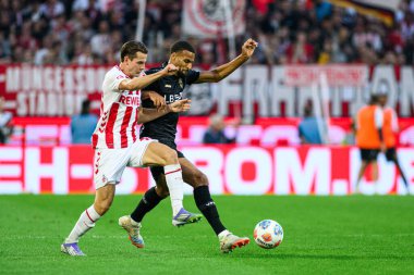 COLOGNE, GERMANY - 28 SEPTEMBER, 2025: Jakub Kaminski, Josha Vagnoman - Bundesliga 1.FC Koeln-VfB Stuttgart maçı Rhein Energie Stadion 'da.