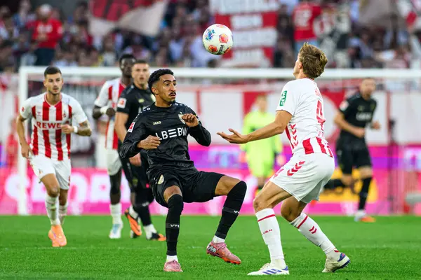COLOGNE, GERMANY - 28 SEPTEMBER, 2025: Tiago Tomas, Timo Huebers - Bundesliga 1.FC Koeln vs VfB Stuttgart maçı Rhein Energie Stadion 'da.