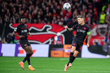 LEVERKUSEN, GERMANY - 1 OCTOBER, 2025: Edmond Tapsoba, Alejandro Grimaldo - The UEFA Champions League football match between Bayer 04 Leverkusen vs PSV Eindhoven at BayArena.