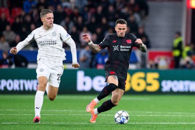 LEVERKUSEN, GERMANY - 1 OCTOBER, 2025: Joey Veerman, Aleix Garcia - The UEFA Champions League football match between Bayer 04 Leverkusen vs PSV Eindhoven at BayArena.