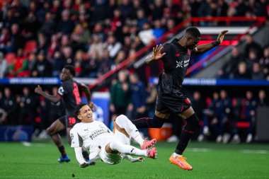 LEVERKUSEN, GERMANY - 1 OCTOBER, 2025: Anass Salah-Eddine, Christian Kofane - The UEFA Champions League football match between Bayer 04 Leverkusen vs PSV Eindhoven at BayArena.