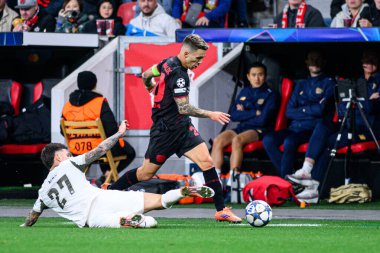 LEVERKUSEN, GERMANY - 1 OCTOBER, 2025: Dennis Man, Alejandro Grimaldo - The UEFA Champions League football match between Bayer 04 Leverkusen vs PSV Eindhoven at BayArena.