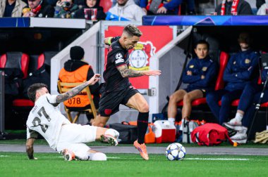 LEVERKUSEN, GERMANY - 1 OCTOBER, 2025: Dennis Man, Alejandro Grimaldo - The UEFA Champions League football match between Bayer 04 Leverkusen vs PSV Eindhoven at BayArena.