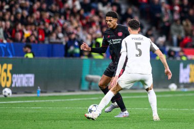 LEVERKUSEN, GERMANY - 1 OCTOBER, 2025: Jarell Quansah, Ivan Perisic - The UEFA Champions League football match between Bayer 04 Leverkusen vs PSV Eindhoven at BayArena.