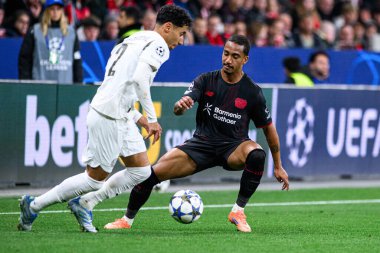 LEVERKUSEN, GERMANY - 1 OCTOBER, 2025: Anass Salah-Eddine, Arthur - The UEFA Champions League football match between Bayer 04 Leverkusen vs PSV Eindhoven at BayArena.