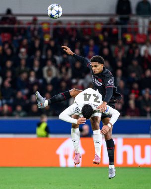 LEVERKUSEN, GERMANY - 1 OCTOBER, 2025: Jarell Quansah, Ismael Saibari - The UEFA Champions League football match between Bayer 04 Leverkusen vs PSV Eindhoven at BayArena.
