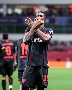 LEVERKUSEN, GERMANY - 1 OCTOBER, 2025: Hristiyan Kofane, hedefini kutluyor - Bayer 04 Leverkusen ile Bayarena 'da PSV Eindhoven arasındaki UEFA Şampiyonlar Ligi futbol maçı.