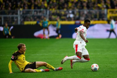 DORTMUND, GERMANY - 4 Ekim 2025: Ridle Baku, Maximilian Beier - 1.Bundesliga maçı Borussia Dortmund vs RB Leipzig at Signal Iduna Park.