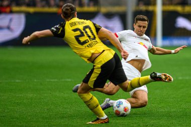 DORTMUND, GERMANY - 4 Ekim 2025: Christoph Baumgartner, Marcel Sabitzer - 1.Bundesliga maçı Borussia Dortmund vs RB Leipzig at Signal Iduna Park.