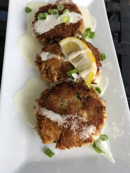 Fresh cooked crab cakes at restaurant. High quality photo