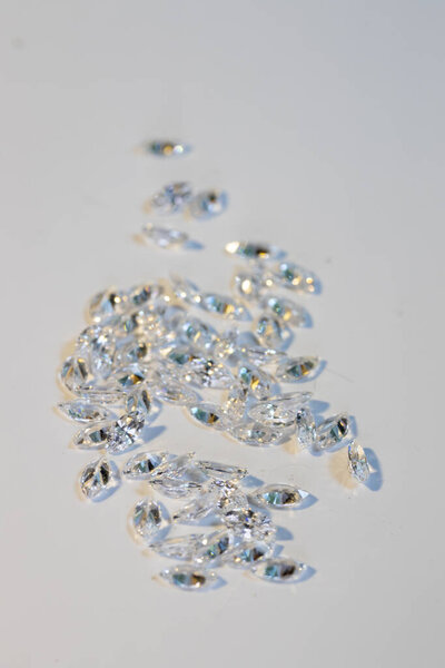 Group of marquis cut diamonds on white. High quality photo