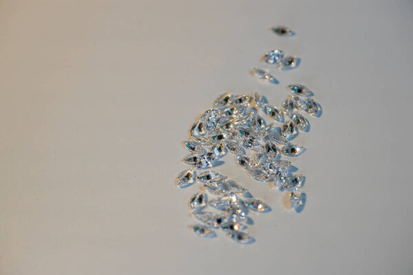 Group of marquis cut diamonds on white. High quality photo