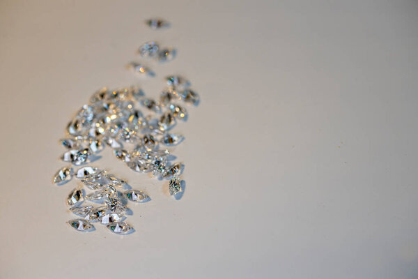 Group of marquis cut diamonds on white. High quality photo