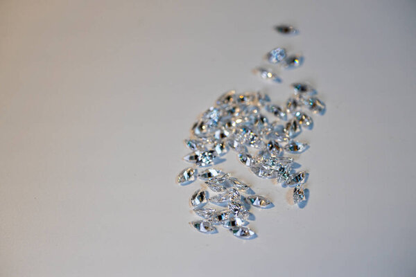 Group of marquis cut diamonds on white. High quality photo