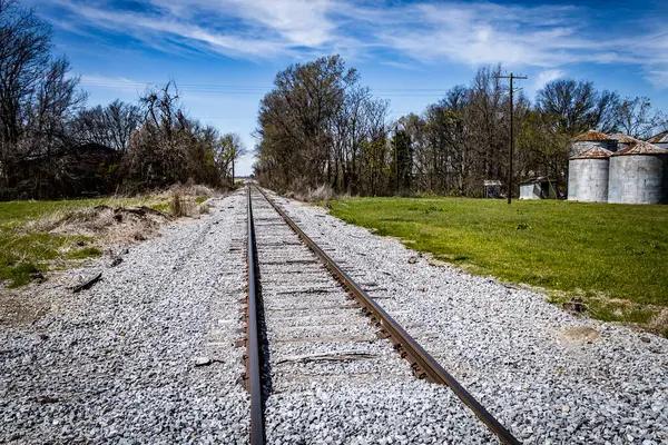 Leading line railroad tracks image. High quality photo