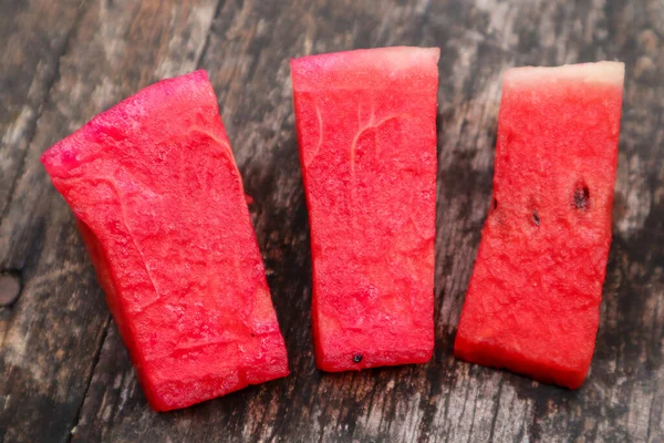 Wassermelone Scheiben Geschnitten Auf Holzgrund — Stockfoto