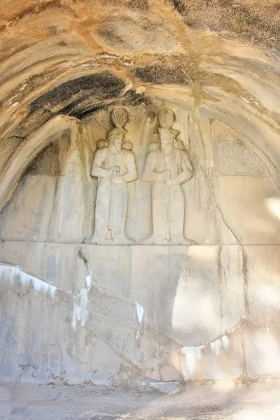 stock image    Taq-e Bostan  site with a series of large rock reliefs  from the era of the Sassanid Empire of Persia, Iran                        