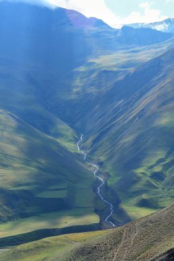 Remote village of Xinaliq located on a hill on the Road running through Greater Caucasus range located in the Quba District in Azerbaijan                                clipart