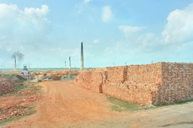 Brick kilns on the plains of Bangladesh clipart