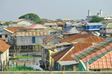      Boat dock and boats  on the  Lake Nokou near Cotonou, Benin                           clipart