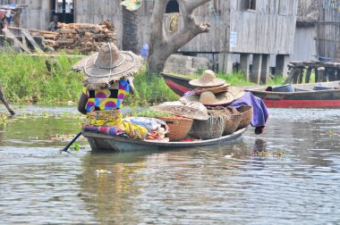 Boat dock and boats  on the  Lake Nokou near Cotonou, Benin clipart