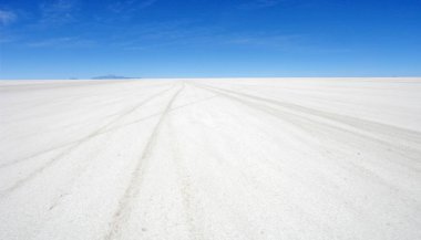 Panorama of the bottom of the dry salt-covered lake Salar de Uyuni in southern Bolivia clipart