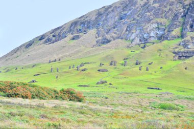 The Rano Raraku volcano on Easter Island is a quarry for carving Moai statues clipart