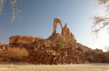 Arch of Bachikele in the shape of lyre, desert of Ennedi, Chad clipart