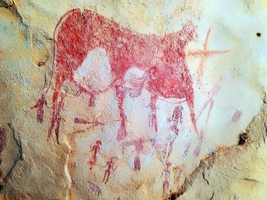 Prehistoric cave paintings on the rocks of the Sahara Desert in Chad clipart