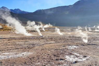 El Tatio  geothermal field with many geysers located in the Andes Mountains of northern Chile clipart