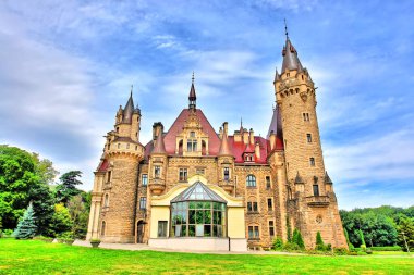 The Moszna Castle   historic castle and palace located in the small village of Moszna, in southwestern Poland.                                
